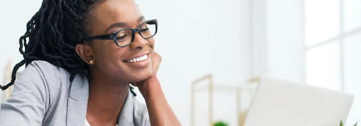 Eye Doctor Brainerd Rd Chattanooga TN Woman In Eyeglasses A woman wearing black framed glasses.