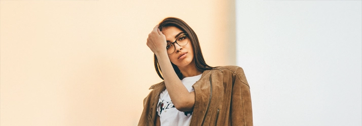 A woman wearing glasses.